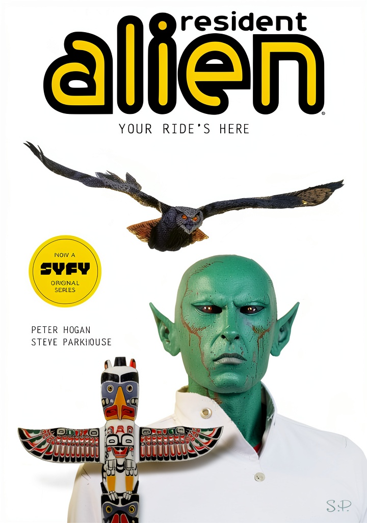 Installing Resident Alien Kindle Dark Horse Books 152‑Page SciFi Comic on a wooden desk